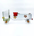 Eco-friendly Aristocrat’s Truck Planter handcrafted by Krystal Kraft from an upcycled Gold Label whisky bottle – functional art combining a planter bed and candle holder for a warm, sustainable home aesthetic.