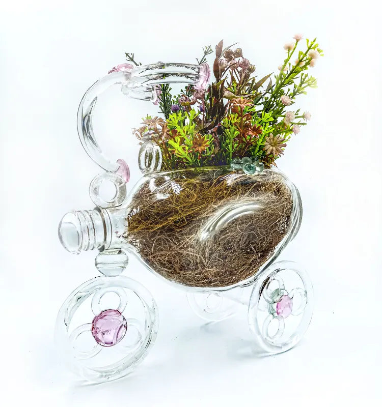 Artisan-crafted upcycled glass bottle tricycle planter, artistic home accent with pink decorative details