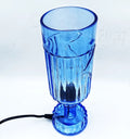 Blue upcycled glass bottle table lamp, handcrafted eco-friendly decor for interior design.