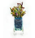 Decorative Tezon Tricycle Planter made from upcycled glass bottles – handcrafted eco-friendly art for stylish homes