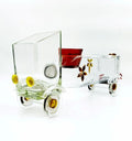 Aristocrat’s Truck Planter handcrafted from a Gold Label whisky bottle by Krystal Kraft – upcycled glass truck design perfect for holding small plants or candles, promoting eco-conscious living.