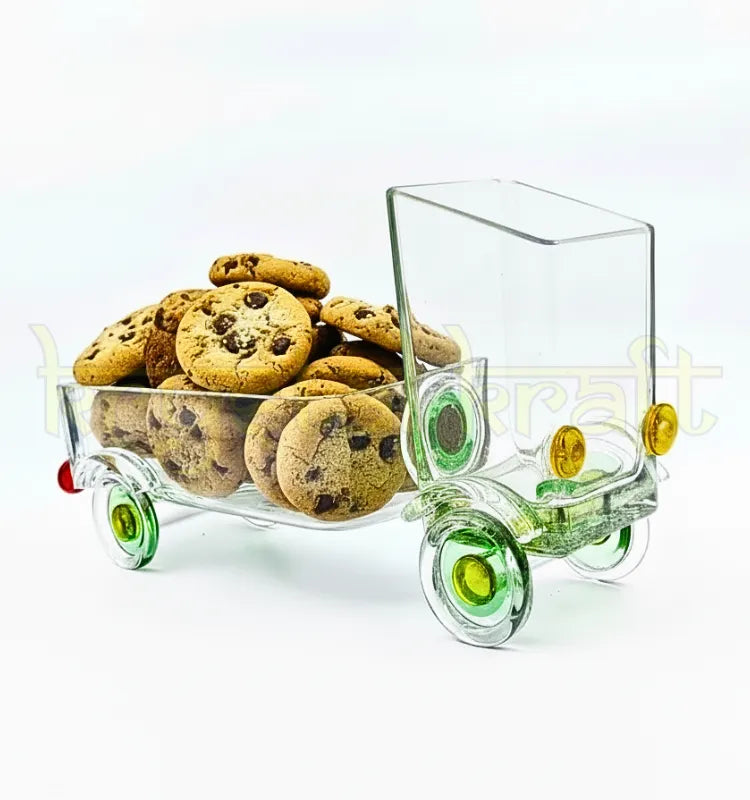 The Green Jaunt Truck handcrafted from an upcycled Gold Label whiskey bottle by Raees Ahmed Merchant for Krystal Kraft – eco-friendly truck-shaped décor piece blending sustainability and artistry."