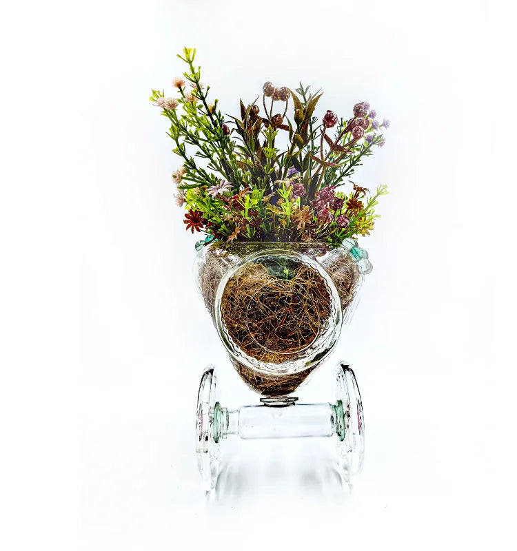 Eco-conscious glass bottle planter in tricycle design, handmade Indian decor by Raees Ahmed Merchant