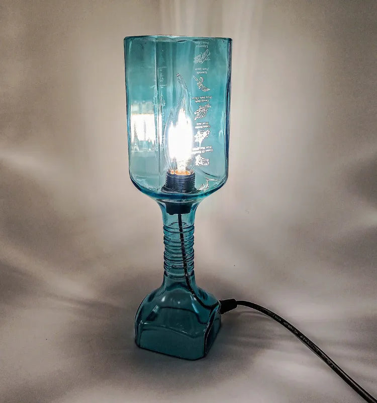 Upcycled bottle lamp illuminating cozy home corners