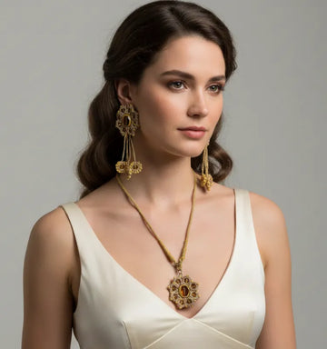 Close-up of the Golden Bloom Tatting Lace Jewelry Set featuring handmade champagne gold chandelier earrings and a matching statement necklace, crafted by artist Shaista Merchant.