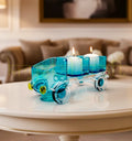Unique Bombay Sapphire Tempo tray by Krystal Kraft, crafted from a repurposed gin bottle featuring multiple sections for nuts, chutneys, and dips; doubles as a candle holder for elegant, eco-friendly entertaining.