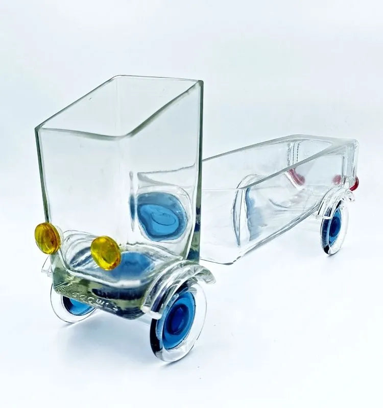 Handmade Merchant’s Marvel Truck Bowl created by Raees Ahmed Merchant from an upcycled Gold Label whisky bottle – multifunctional serving bowl and decorative art piece by Krystal Kraft.