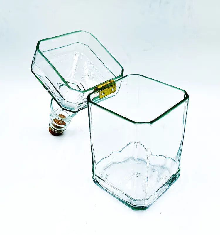 Handcrafted upcycled Jack Daniel's bottle canister, clear glass with cork stopper, aesthetic serving and quirky gift idea.