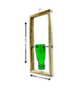 Eco-conscious handmade glass bottle planter mounted on wall frame, ideal for indoor or outdoor greenery