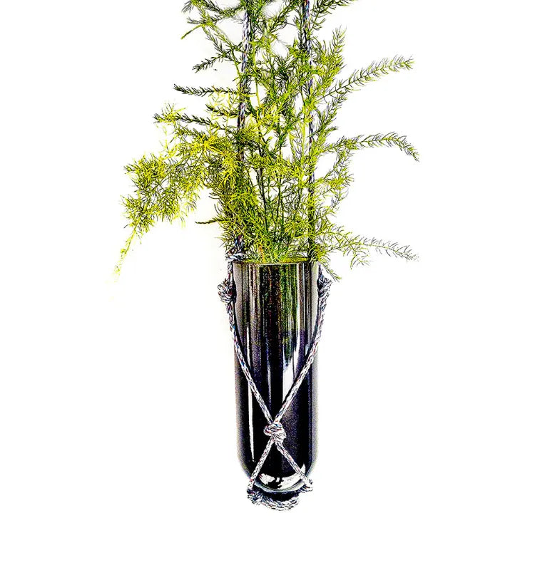 Handmade recycled glass bottle planter in green, stylish hanging design for living room, kitchen, or outdoor garden spaces