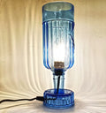 Handmade table lamp from repurposed blue glass bottle, aesthetic night lamp decoration for living room.