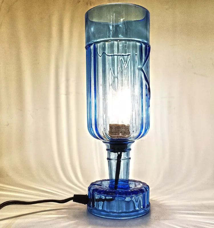 Handmade table lamp from repurposed blue glass bottle, aesthetic night lamp decoration for living room."