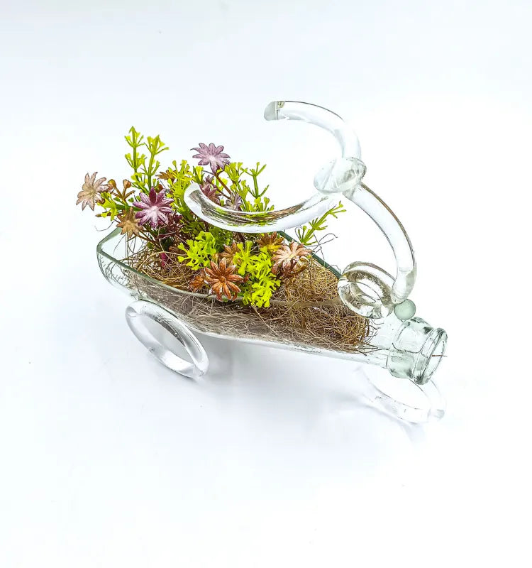 Handmade upcycled glass baby carriage planter with coco‑coir liner and succulents