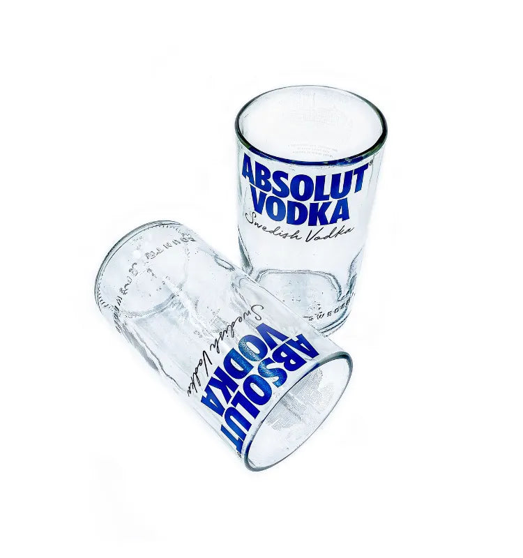 Handcrafted Krystal Kraft upcycled glass drinkware made from Absolut bottles, perfect for eco-conscious gifts and décor
