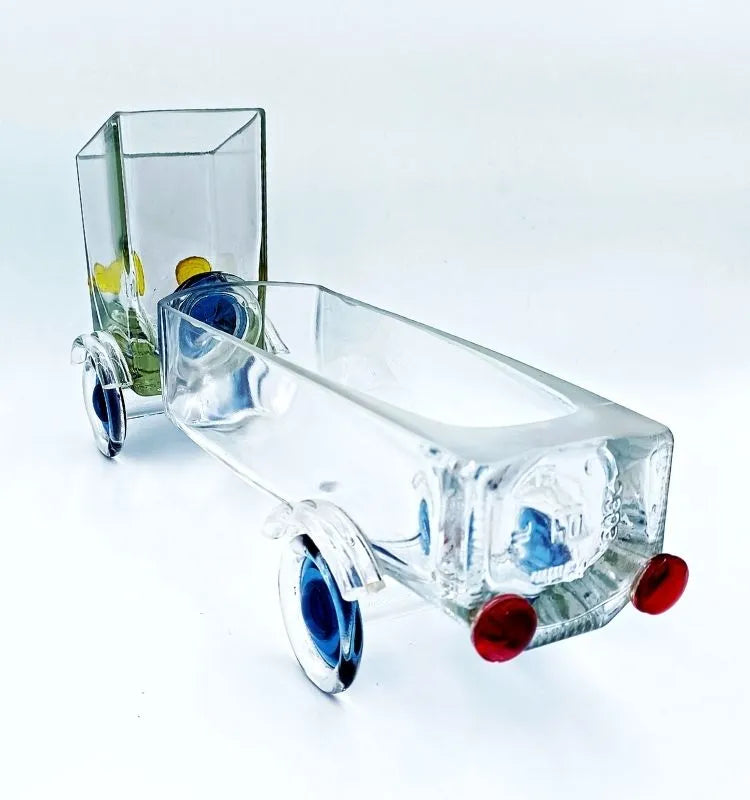 Merchant’s Marvel Truck by Krystal Kraft, handcrafted from a repurposed Gold Label whisky bottle – versatile truck design serving bowl ideal for nuts, candies, and décor styling.