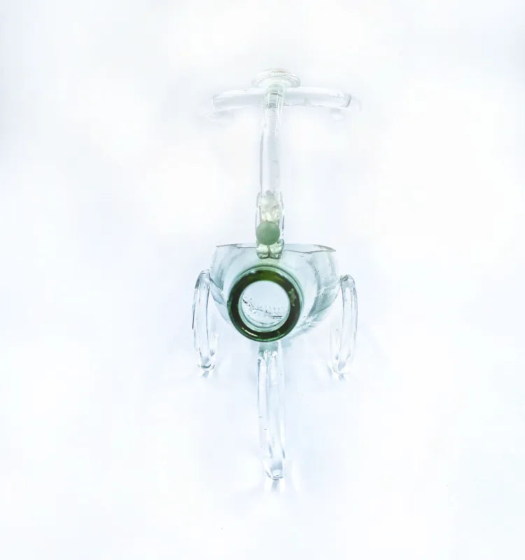 Nursery shelf accent—upcycled glass stroller planter with coco‑coir liner, no plants included