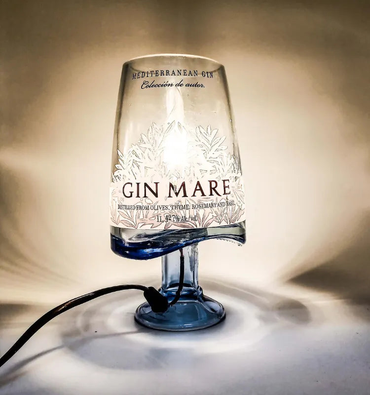 Recycled Gin Mare bottle lamp offering eco-friendly handmade lighting ideal for modern and minimalist interiors.