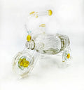 Recycled glass bottle tricycle planter close-up view