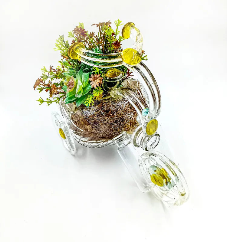 Side view of unique upcycled glass tricycle planter by Raees Ahmed Merchant