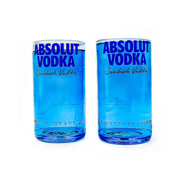 Sustainable glassware and bottle art by Krystal Kraft featuring recycled Absolut glass bottles transformed into unique drinkware