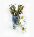 Tezon Tricycle Planter handmade from upcycled glass bottles by Raees Ahmed Merchant for eco-friendly home décor