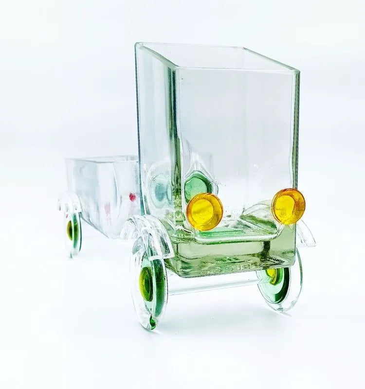 The Green Jaunt Truck designed by artist Raees Ahmed Merchant – upcycled whiskey bottle transformed into an artistic and sustainable centerpiece perfect for gifting or decorating.