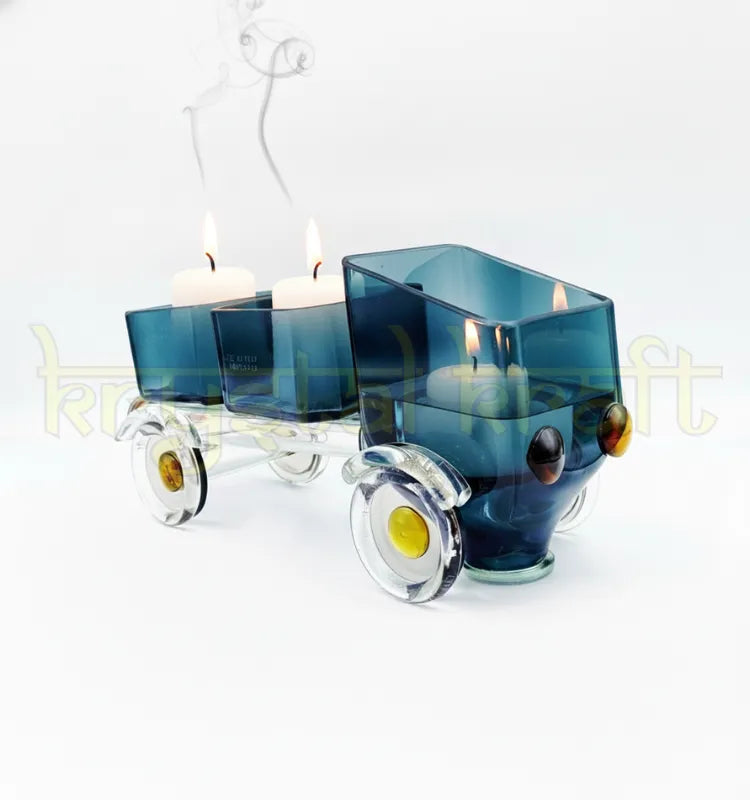 Handcrafted Glass Tempo by artist Raees Ahmed Merchant from Krystal Kraft – vintage-inspired upcycled black glass bottle sculpture with amber headlights and yellow highlights, ideal for home décor, collectors, or as a striking centerpiece.