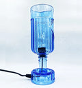 Unique upcycled glass bottle lamp, quirky gift and statement piece for home decor.