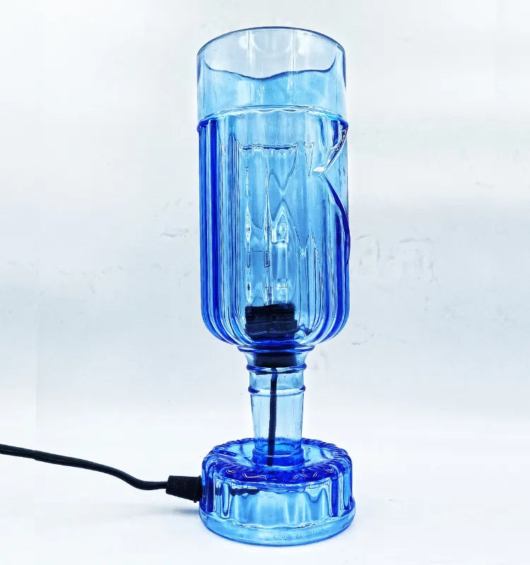 Unique upcycled glass bottle lamp, quirky gift and statement piece for home decor."