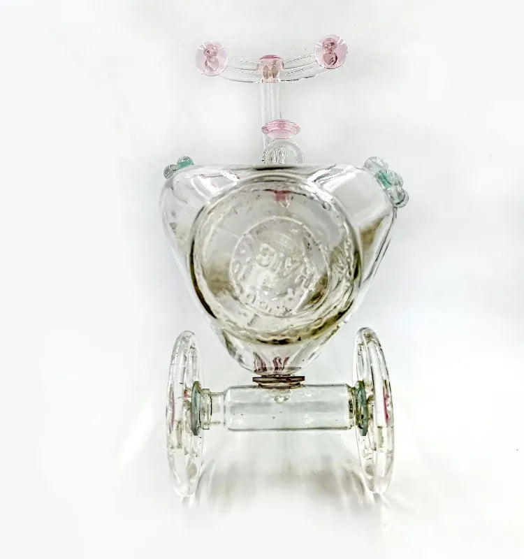 Unique upcycled tricycle planter with plant arrangement, glass art home accent by Raees Ahmed Merchant