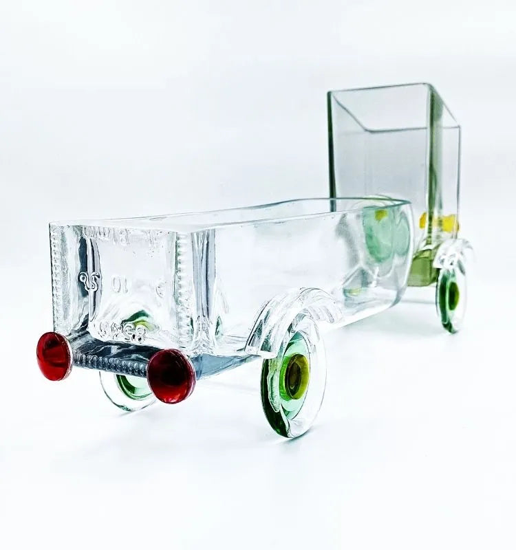 Upcycled Gold Label whiskey bottle transformed into The Green Jaunt Truck – multifunctional handcrafted serving dish and home décor centerpiece promoting eco-friendly living.