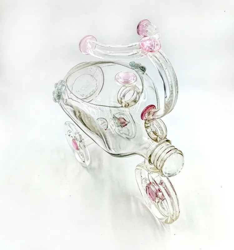 Upcycled glass bottle tricycle planter with artificial plants, handcrafted eco-friendly home décor piece