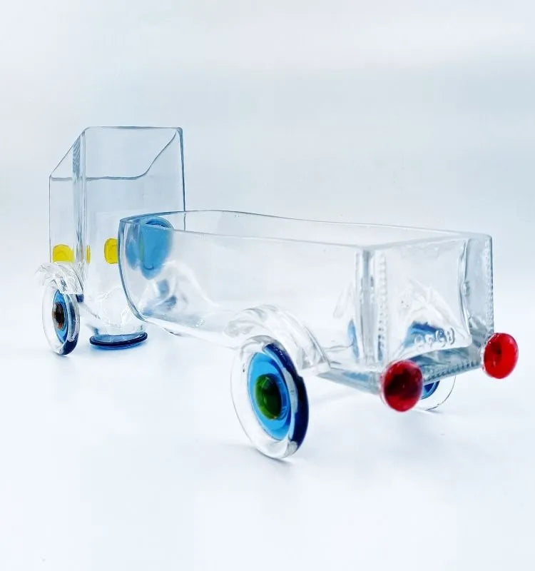Zoom Zoom Truck Snack Server handcrafted from transparent glass by Krystal Kraft, made using a repurposed whisky bottle – versatile piece for serving snacks, flowers, or candles at home events.