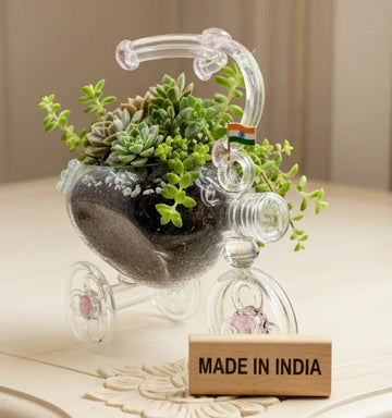 “Upcycled Elegance bottle art by Krystal Kraft artist Raees Ahmed Merchant, handcrafted sustainable décor made in India from recycled glass bottle art