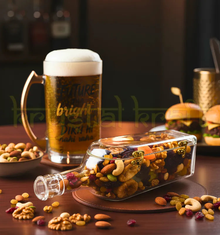 Upcycled Johnnie Walker glass bottle canister on modern kitchen countertop storing cashews almonds dry fruits next to coffee maker elegant home decor storage solution handcrafted by Krystal Kraft artist