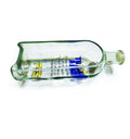 Absolut bottle planter with wooden base styled in a modern interior