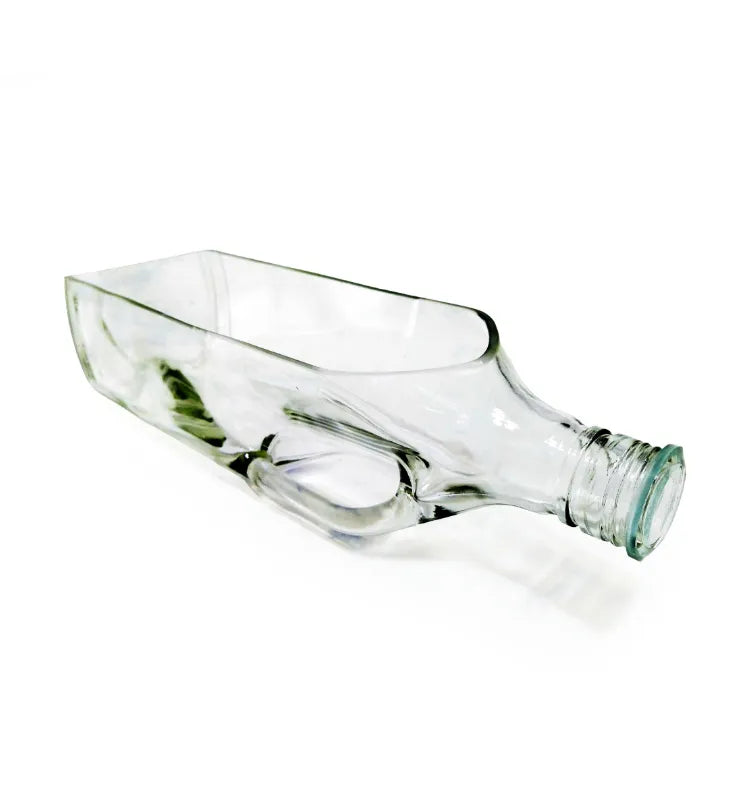 Upcycled Black Label glass bottle planter displayed on a modern office desk.