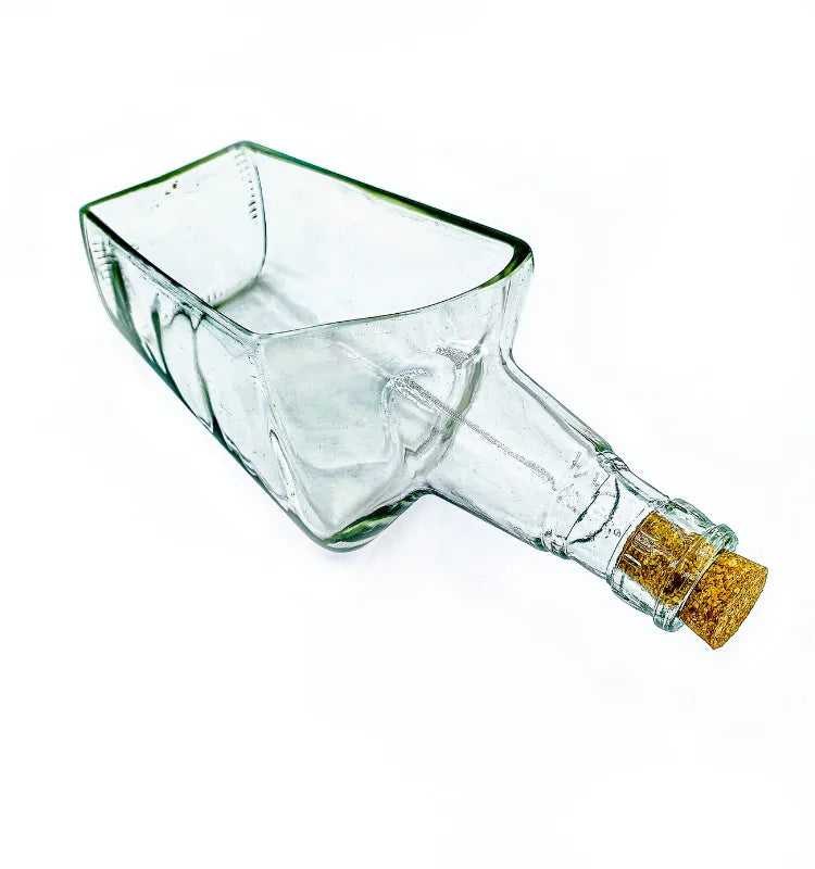 Tabletop bottle planter styled on a desk as a decorative interior accent.