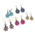 “Artisan-made quilling earrings showcasing unique lightweight designs crafted by Farisa Merchant under Krystal Kraft.”