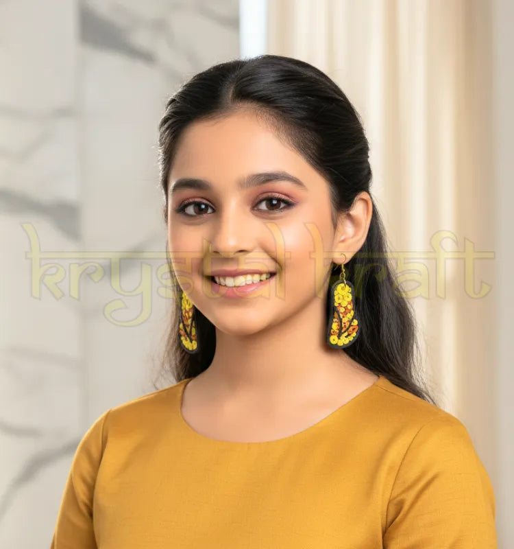 Orange and yellow flip-flop paper quilling earrings by Krystal Kraft, handmade eco-friendly statement jewelry.