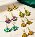 Handmade multicolor paper quilling earrings set of 5 by Krystal Kraft, crafted by artist Farisa Merchant”