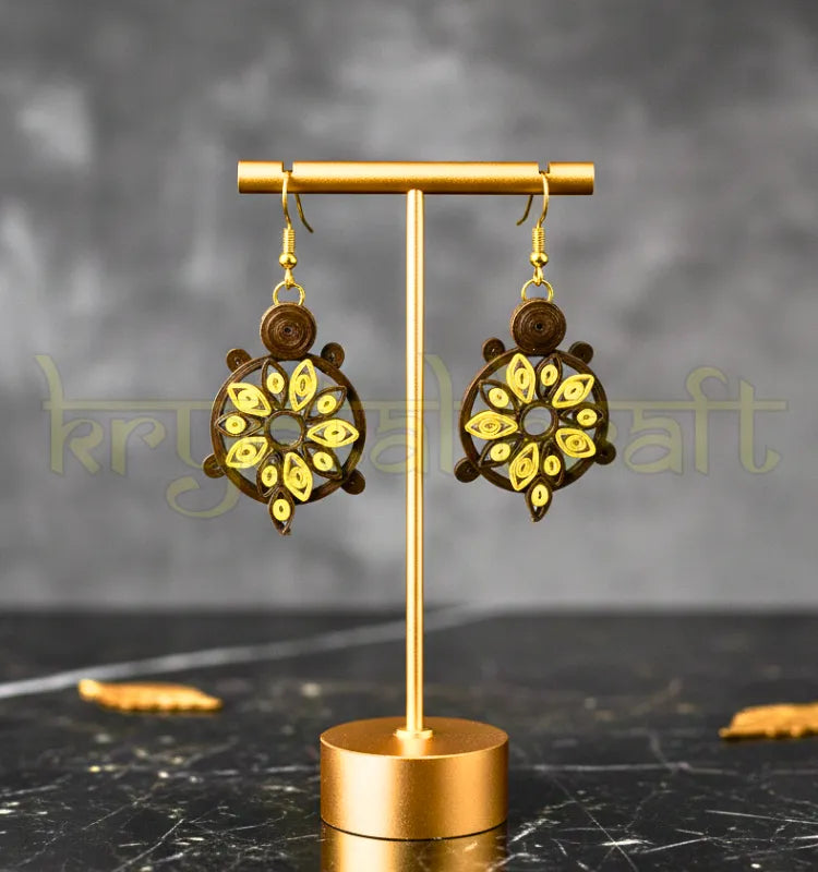 Handcrafted green and yellow turtle paper quilling earrings made by artist Farisa Merchant, eco-friendly and lightweight.