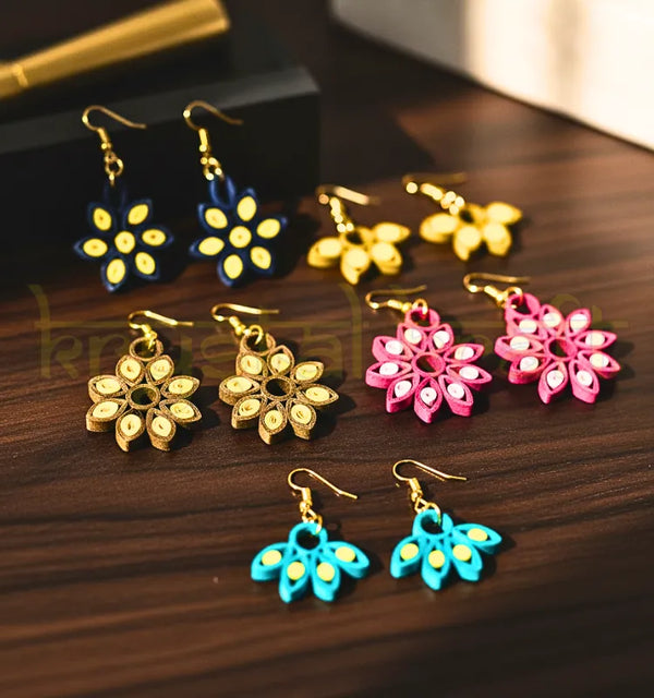 Eco-friendly artistic paper quilling jhumka earrings in vibrant colors, handmade sustainable jewelry.