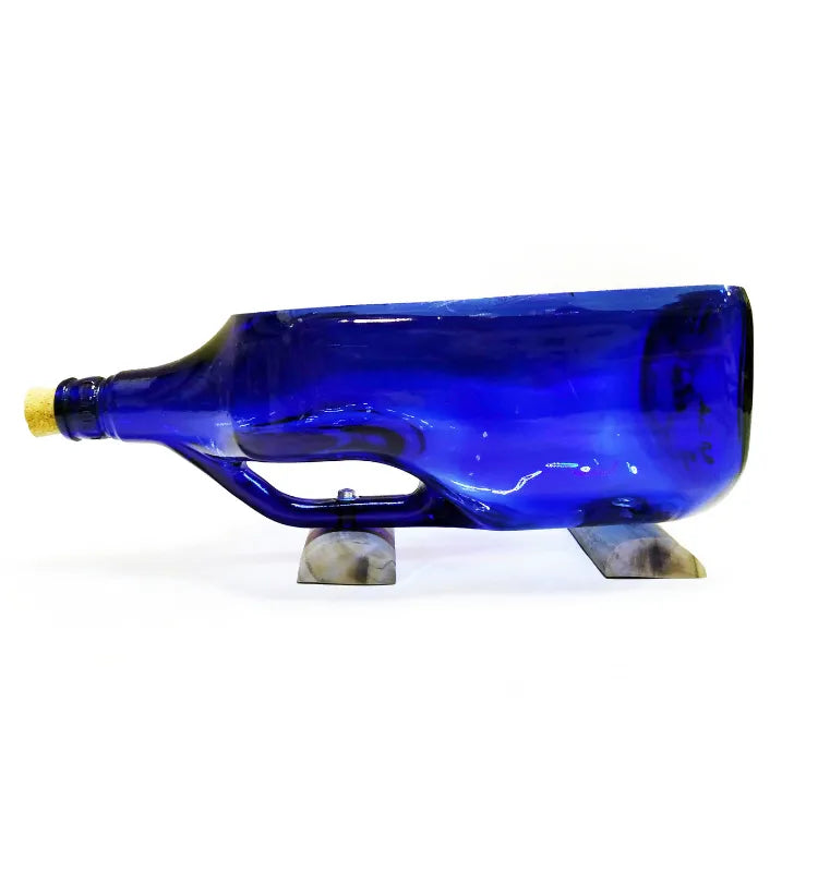 Close-up of deep antique blue glass texture on 2 litre bottle planter