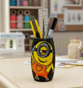 Hand-painted Cool Minion on a recycled black glass bottle with orange and yellow acrylics — a creative, eco-friendly mini vase or desk décor by Krystal Kraft.