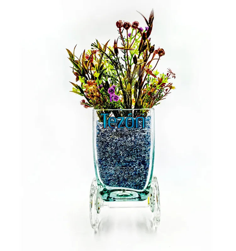 Tezon Tricycle Planter handmade from upcycled glass bottles by Raees Ahmed Merchant for eco-friendly home décor