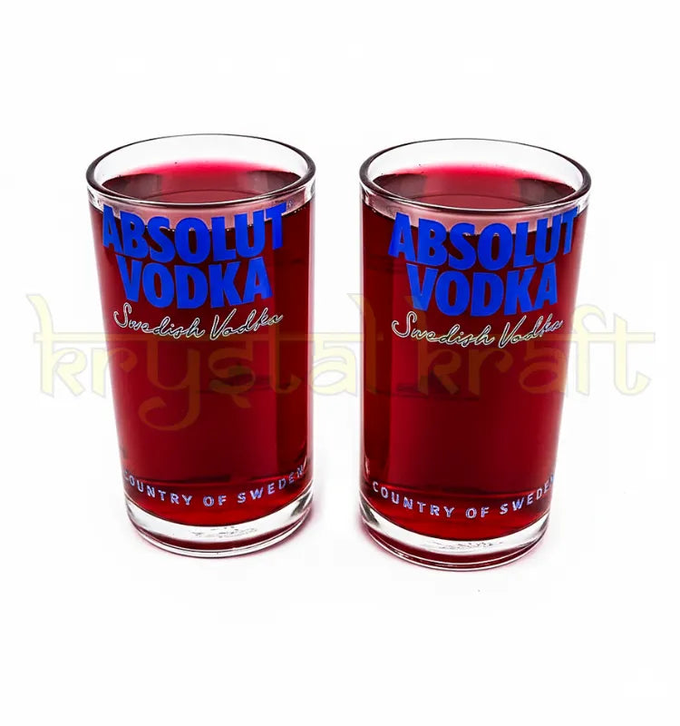 Pair of eco-friendly glass tumblers upcycled from Absolut bottles, ideal for cocktails or whiskey.