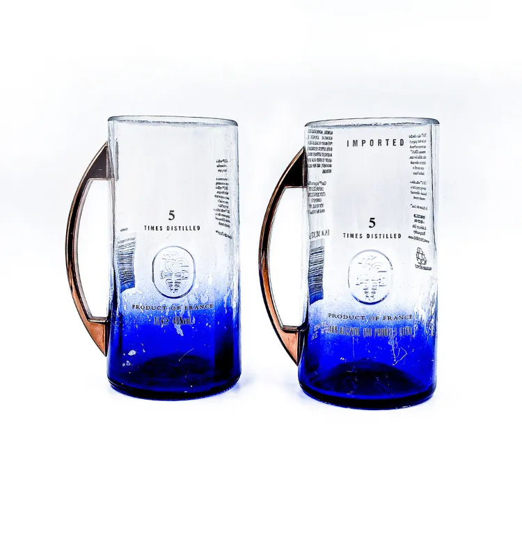 Set of two upcycled Ciroc bottle glasses by Krystal Kraft, ideal for eco-conscious barware and sustainable home décor enthusiasts.