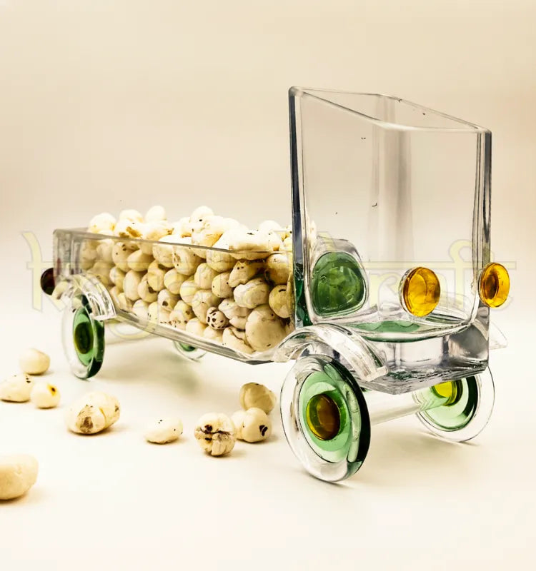 Handcrafted Upcycled Gold Label Glass Bottle Truck by Krystal Kraft, designed by Raees Ahmed Merchant – a sustainable and multifunctional glass art piece perfect as a snack server, candle holder, or floral centerpiece.