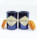 Stylish Hendrick’s bottle-inspired glass storage jars made from recycled materials with a tapered cork lid, ideal for storing cookies, pulses, pasta, or dry fruits.